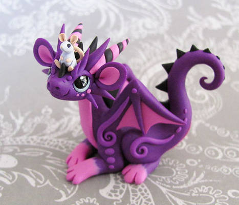 Purple dragon with mouse buddy