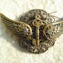 key wings curly broach