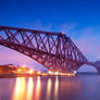 Forth Bridge with a pink sky