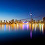 Toronto skyline lit up at night (Ground view)