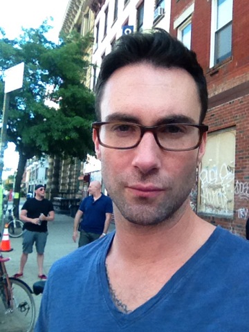 Adam Levine with glasses.