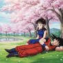Goku and Chi-Chi resting in the cherry blossoms.