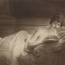 vintage seminude woman reading