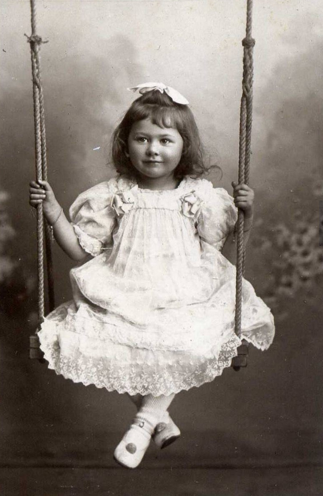 Vintage little girl in swing 002