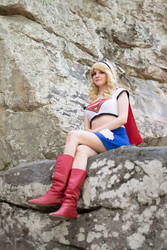 Supergirl on a Cliff