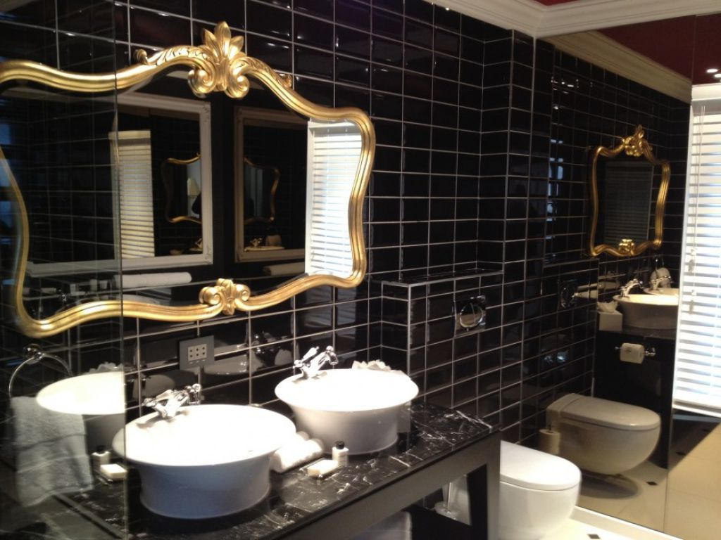 Special-black-bathroom-with-golden-mirror-frame-fo by Tsnophaljakarax