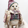 An owl-doll in pink.
