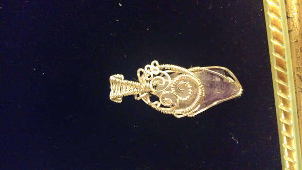 Tiny raw amethyst pendant