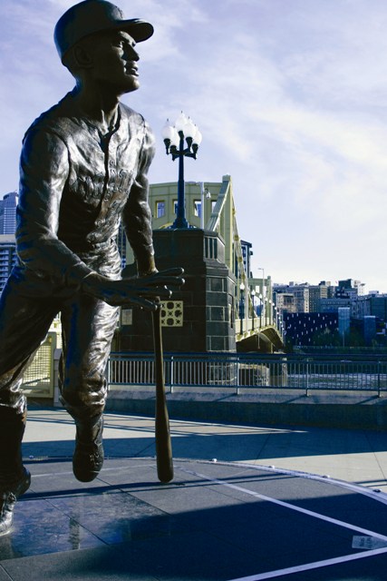 clemente statue and bridge