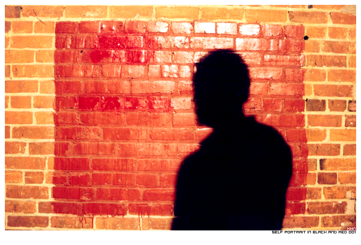 self portrait in black and red