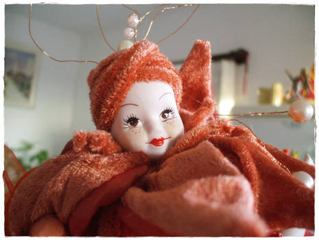 the red doll's face