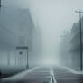 Empty street at foggy morning