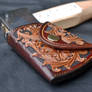 Tooled leather axe cover