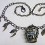 Upcycled caged bird necklace