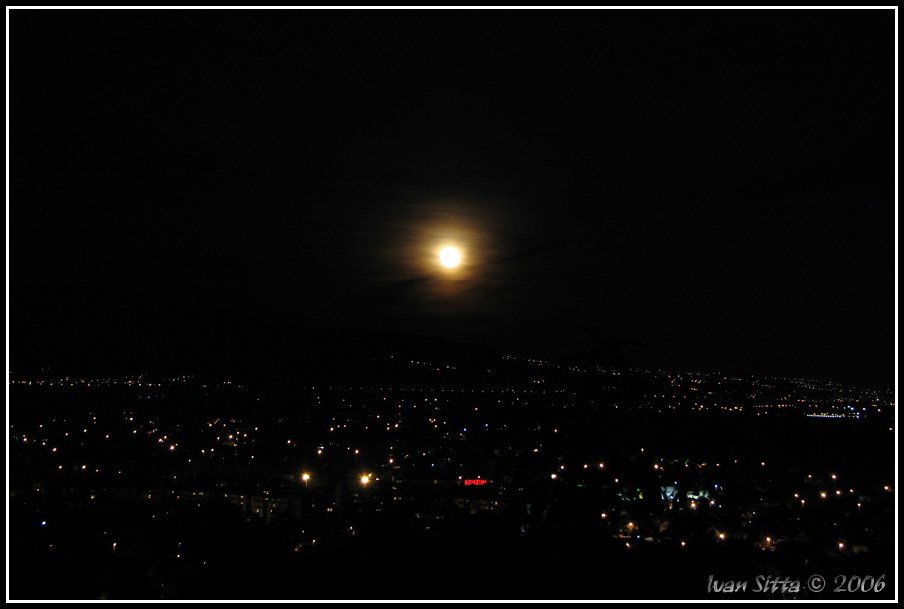 Moon over city