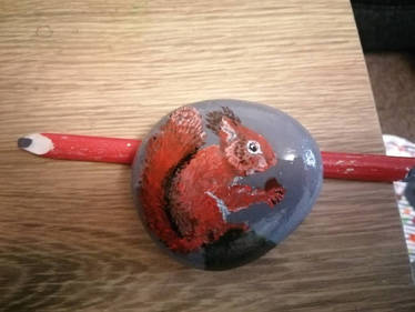 Red Squirrel on Pebble