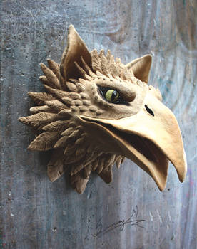 Gryphon head sculpture