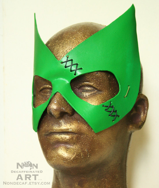 green leather hero mask with black stitching