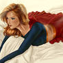 Supergirl on bed