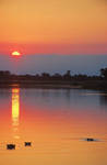 Sunset over Lower Sabi Dam by AfricanObserver