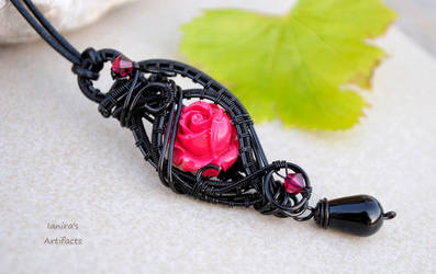 Black wire wrapped pendant with red rose