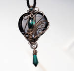 Black heart pendant with emerald green drops