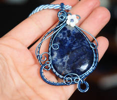 Sodalite with white flower pendant