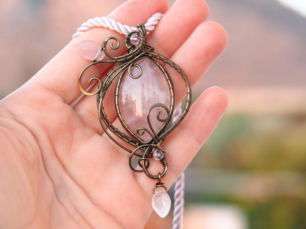 Rose quartz wire wrapped pendant with leaves