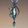 Wire wrapped labradorite pendant with blue leaves