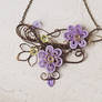 Wire wrapped bib necklace with paper flowers