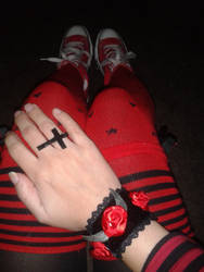 Red roses bracelet and cross ring.