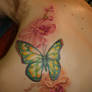 Orchids and butterfly tattoo