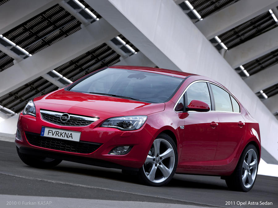 Опель хэтчбек 2011. Opel Astra j 2010. Opel Astra j 2011. Opel Astra 2011.
