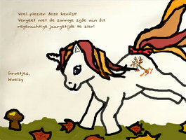 Little pony playing in autumn