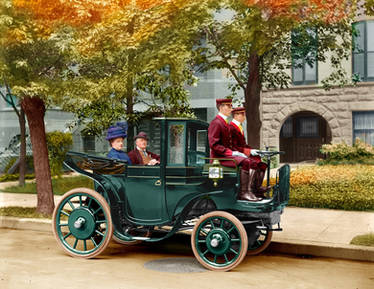 Sen.WetmoreI and Wife in Horseless Carriage 1906