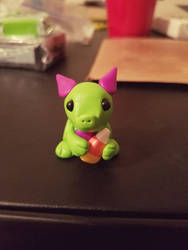 POLYMER CLAY Dragon holding a candy corn