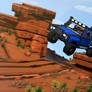 Pickup truck racing in a mesa