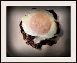 Hamburger with nested egg by FallisPhoto