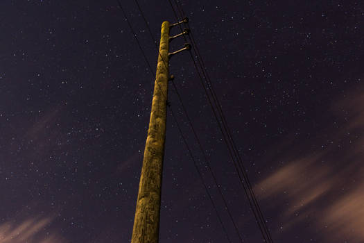 Powerlines against the stars