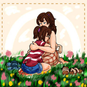 Laura and her mom hugging on the flower fields