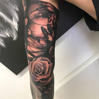 Dark sleeve tattoo by TattooistWilkinson