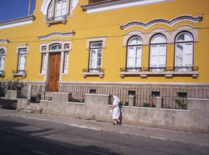 Yellow house and the nun.