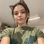 Cute cat girl in green shirt