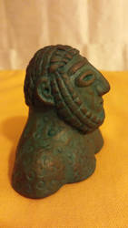 Ancient bronze look sculpture