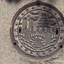 Osaka City manhole cover skyline