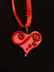 pink and red heart pendant