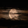 moon behind the clouds