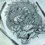 Shoulder dragon tattoo