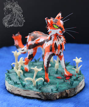 Maple. Cats are warriors. Figurine of a cat