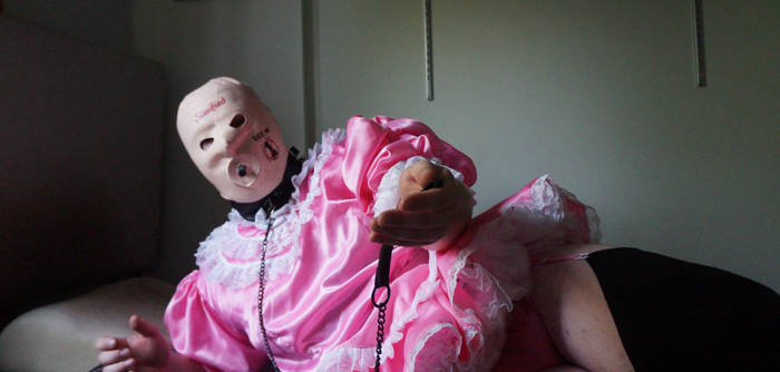 sissy maid  giving leash laying down